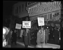 American Legion Un-American activities committee members picketing premiere of the film, "Moulin Rouge" in Los Angeles, Calif., 1952