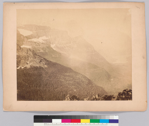 [Summit of Rocky Mountains, looking west toward Gardner Point and Upper Kintla Lake, from boundary cairn near Cameron Lake and Forum Peak. Boundary carin with British flag, July 1861 - left half of panorama.]