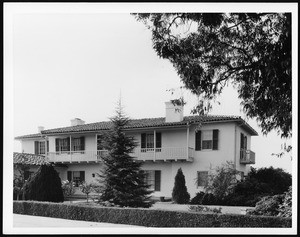 Exterior view of a two-story Spanish Revival-style house in Los Angeles
