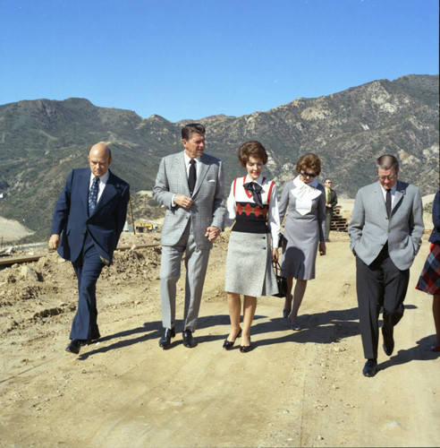 Ronald Reagan and group tour campus during Pepperdine University tree planting dedication, 1973