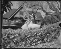 Little girl on the "A Midsummer Night's Dream" float in the Tournament of Roses Parade, Pasadena, 1935