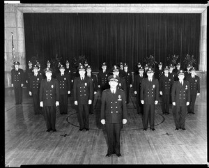 Group portrait of Chief William Parker and his command staff, posed in the gymnasium of the Los Angeles Police Academy, ca.1948