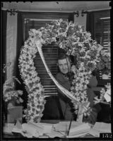Leland M. Ford receives flowers as County Supervisor, Los Angeles, 1936