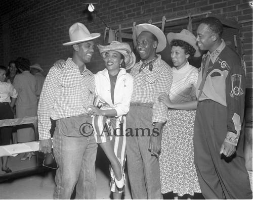 Men and women in western themed attire, Los Angeles, ca. 1955