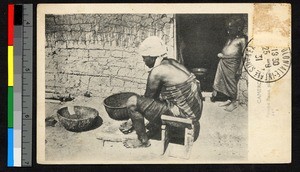 Bassa woman grinding maize, Cameroon, ca.1931