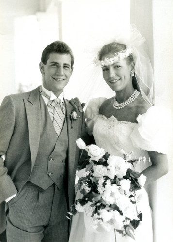 Mr. and Mrs. Alan J. Peril weeding photograph