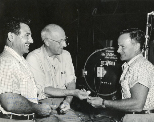 Chico Day, Cecil B. DeMille, and Micky Moore on the set of "The Ten Commandments" (1956)