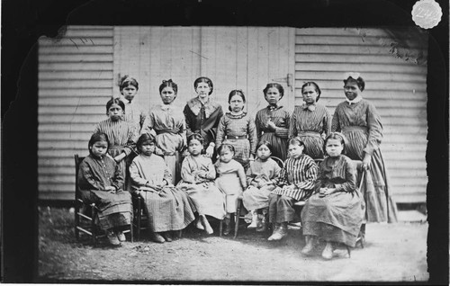 Group of Ottawa girls with teacher, near Shawnee, Oklahoma, Indian Territory
