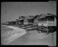 Beach houses threatened by tide, Newport Beach, 1934