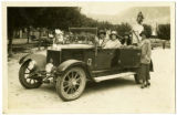 Four women with car "Miss Wylie at the wheel Miss Banett beside her in the rear Miss Wittler. Bessie Beatty is standing."