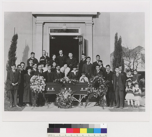 Funeral of early church member (Mr. Sasaki?) Prob about 1918. Rev. Hukaga--(bearded man behind coffin). Yosibi Toga standing extreme left. [illegible] Hoyakawa, D.T. Uchida--rear row