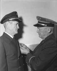 Fire Chief James (Slim) Eaglin receiving his badge, Petaluma, California, 1956