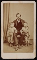 Portrait of Charles Wade with two children