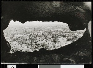 View of the desert from a hole in a rock near Phoenix, Arizona
