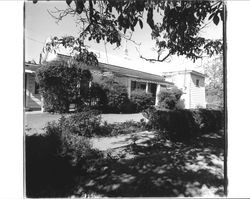 Unidentified single-story house with adjoining tankhouse in Petaluma, California, 1960s or 1970s