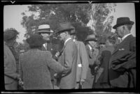 Doc Ashby talks to other attendees of the Iowa Picnic in Lincoln Park, Los Angeles, 1939