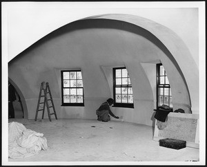 Electrician working inside one of architect Wallace Neff's bubble houses, 1940-1949
