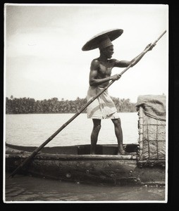 Malabar: River boatsman working his pole