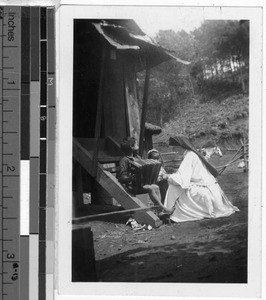 Maryknoll Sister visiting two Filipino children, Baguio, Philippines, ca. 1920-1940