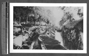 Boats crowding a waterway, Jinan, Shandong, China, ca.1940