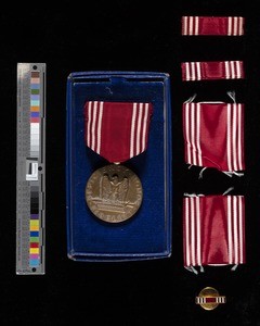 Good conduct medal with ribbons and pin