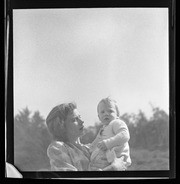 Woman holding child, California Labor School