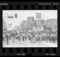 Demonstrators, with banners in Spanish, marching in protest to President Jimmy Carter's illegal alien program, Los Angeles, Calif., 1977