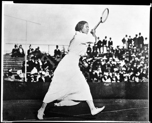 Molla Mallory of Long Beach, tennis champion, in a tennis match, 1910