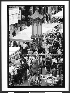 Crowds of people walking on Sacramento Street, Chinatown, San Francisco, California, 2002