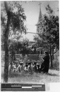 Native Sister instructing a group of boys, Saiho, Korea, ca. 1930-1950