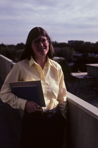 Sue Sim (Staff Research Associate) on Hutchison Hall balcony