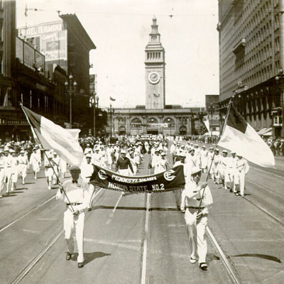 [Marchers representing Pennsylvania in a parade on Market Street]