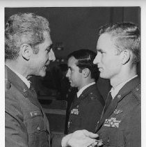 Captain Michael R. Martini, receiving the Bronze Star from Brig. Gen. Robert Bazley