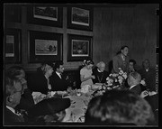 Girl standing next to the Dean of Canterbury at luncheon, California Labor School