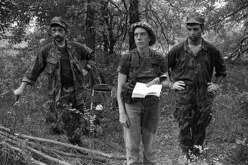 Survival school students learn from a book, Liberal, 1982