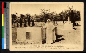Missionary father standing beside tomb, Algeria, ca.1920-1940