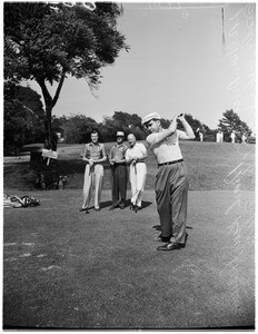 Nixon playing golf, 1955