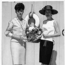 Two unidentified women model outfits