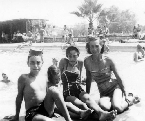 Family at swimming pool