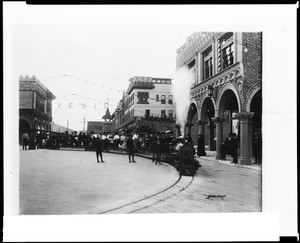 Passengers riding a miniature railroad on Windward Avenue in Venice, looking west, ca.1905