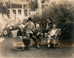 [Group portrait in backyard]