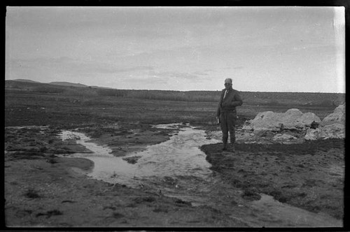Man standing near tufa, Mono County, [1929?]
