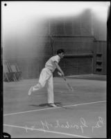 Tennis player Ben Gorchakoff swings his tennis racket, Los Angeles, 1928