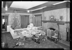 Christmas toys and the baby, Southern California, 1930