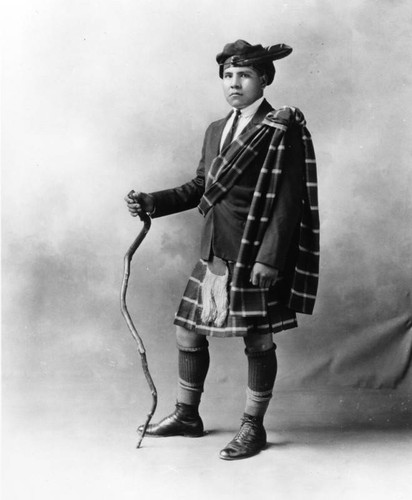American Indian student dressed in Scotsman's Kilt