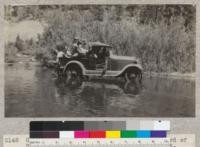 Camp Califorest. Field trip to lumber yard of Spanish Peak Lumber Company at Gray's Flat. The University Ford does double duty and carries passengers of a disabled car. Crossing the north fork, Feather River. E. F. July, 1931