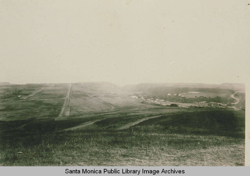 Initial grading begins for downtown area of Pacific Palisades, Calif. showing tents of the early settlers