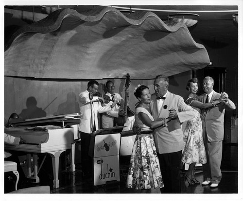 "2 couples dancing. P.C. 51 HVW 9/54"