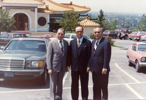 Poy Wong (left), and Wilbur Woo (right) in front of the Fung Lum Restaurant, Universal City