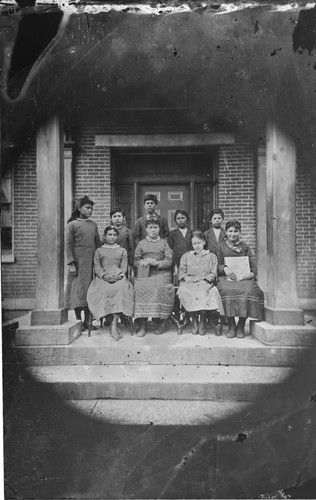 School children photographed on front steps of school
